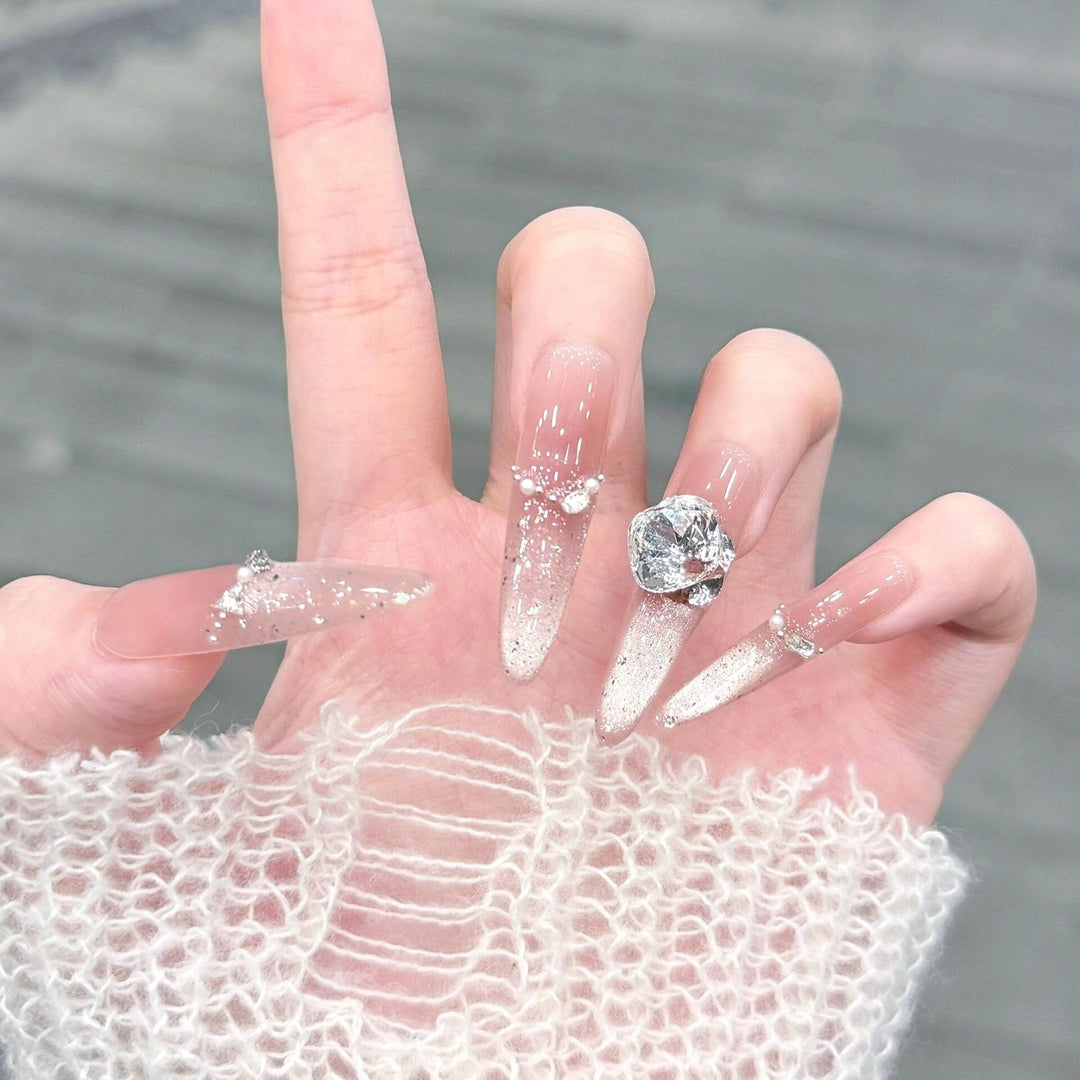 Artificial nails with glitter and crystal embellishments Kalsten