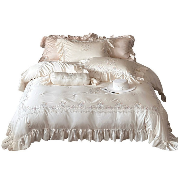 Luxurious satin bedding set with fine floral embroidery and ruffles