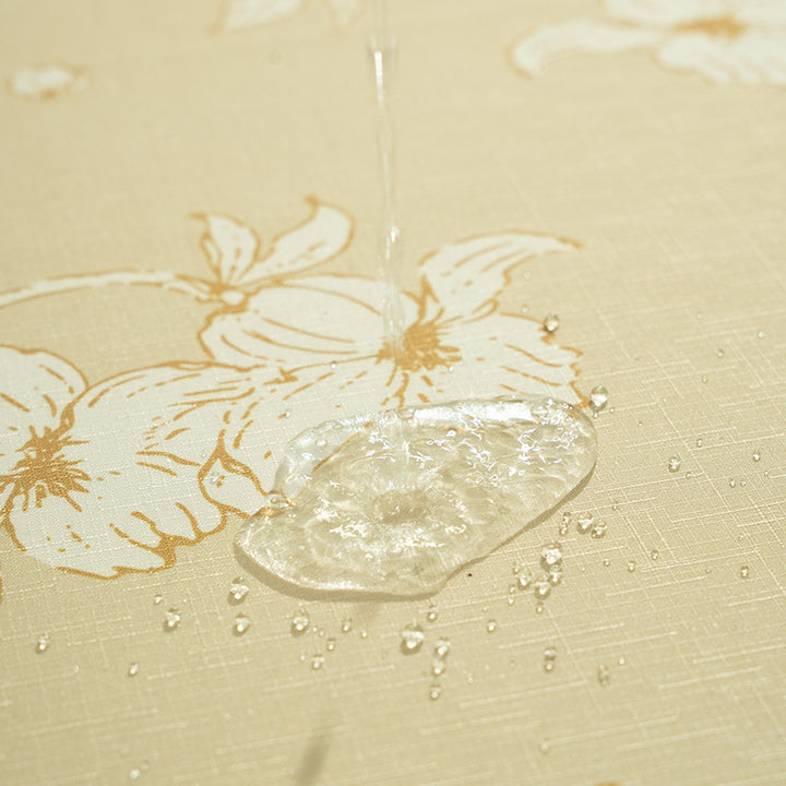 Round wipeable tablecloth with floral cut-out hem Kalsten