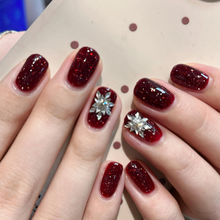 Glamorous artificial nails with rhinestone applications Kalsten