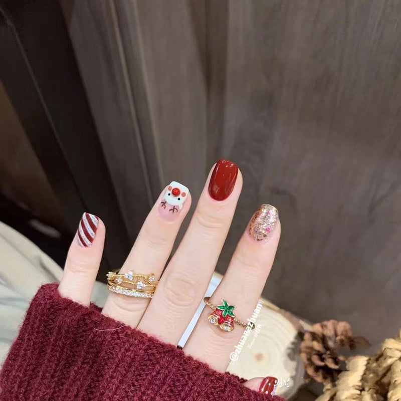 Artificial nail design with festive Christmas motif Kalsten