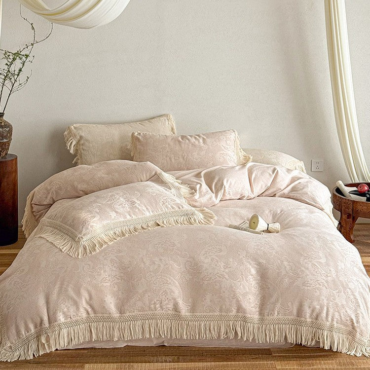 High-quality jacquard bed linen set with decorative fringed trim made of cotton satin