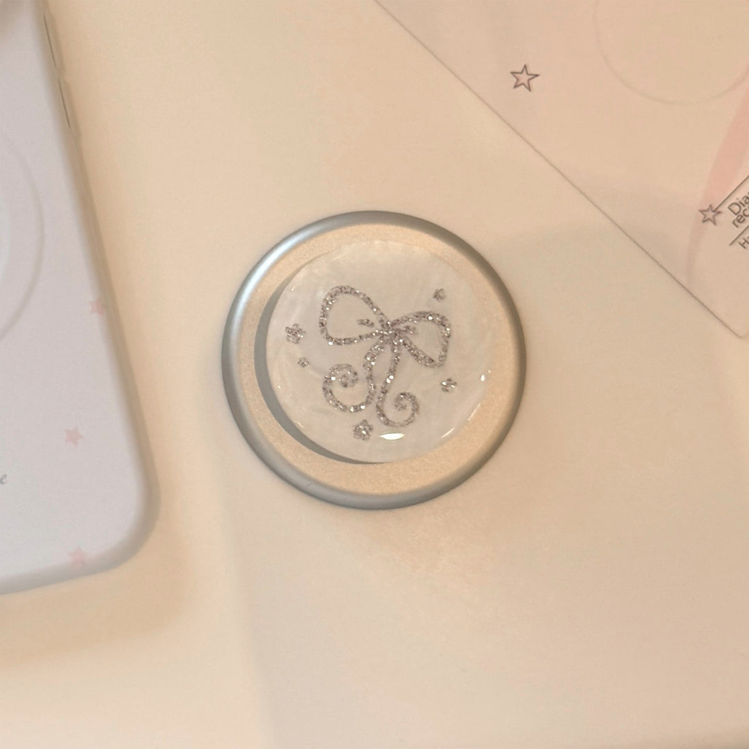 Stylish smartphone finger holder with glitter bow design Kalsten