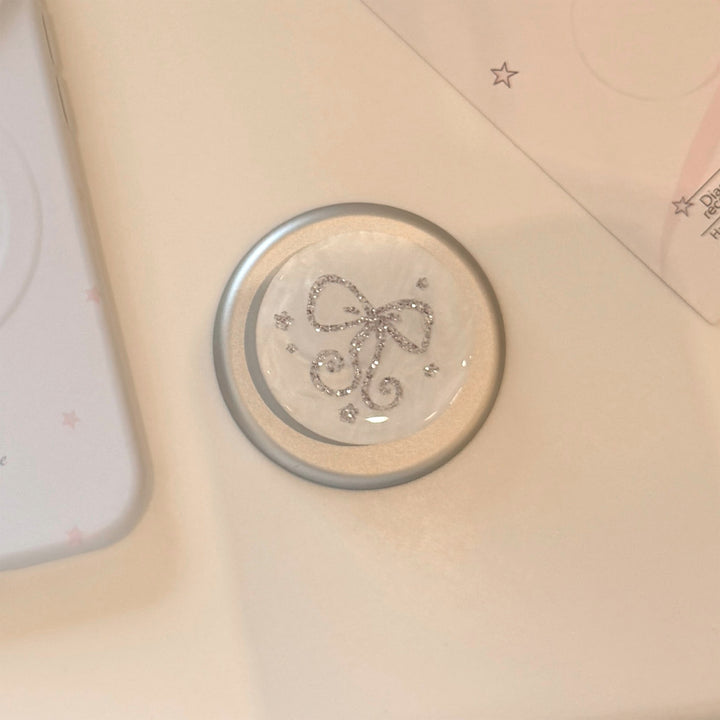 Stylish smartphone finger holder with glitter bow design Kalsten