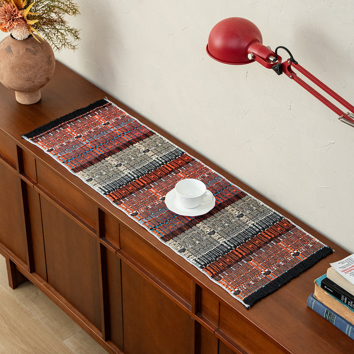 Woven table runner in ethnic look made of cotton blend with fringes Kalsten