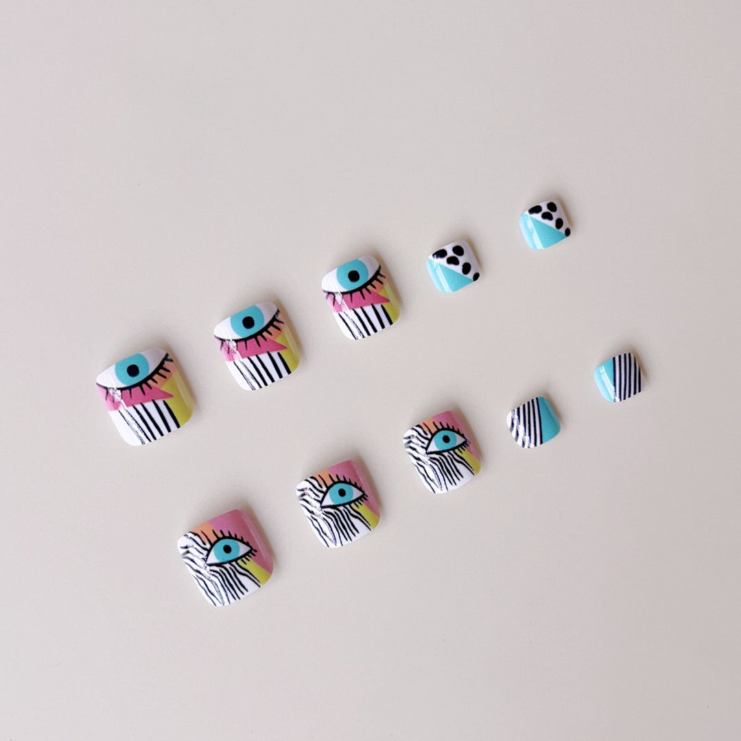 Artificial nail set with vibrant color accents and geometric patterns Kalsten