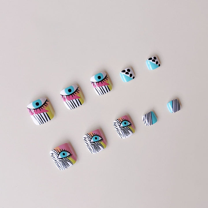 Artificial nail set with vibrant color accents and geometric patterns Kalsten