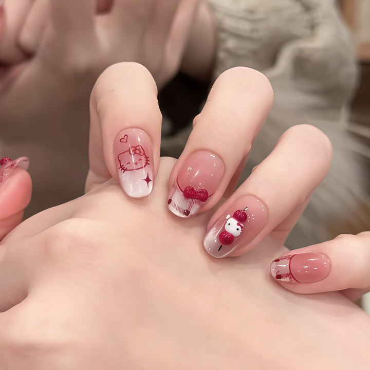 Artificial nails with playful Hello Kitty design Kalsten