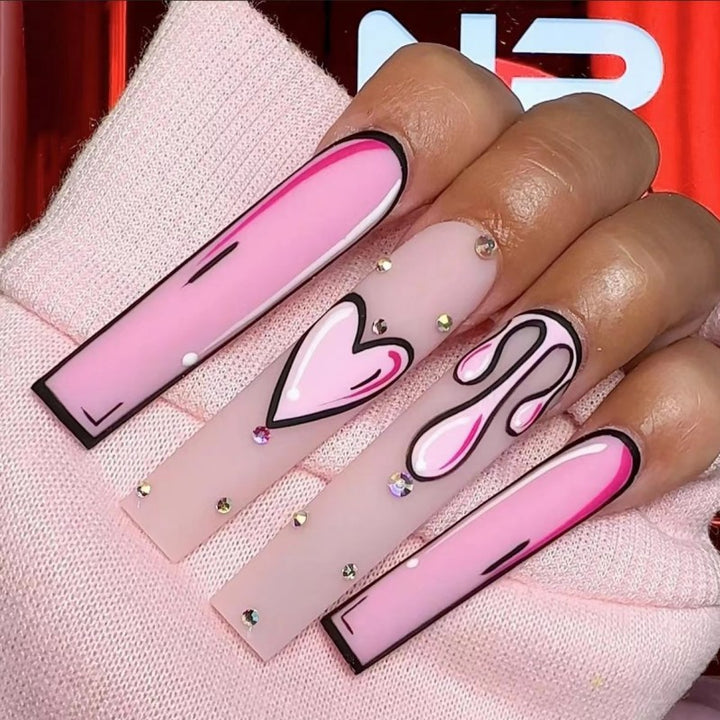 Eye-catching artificial nails with soulful heart design and glamorous accents Kalsten