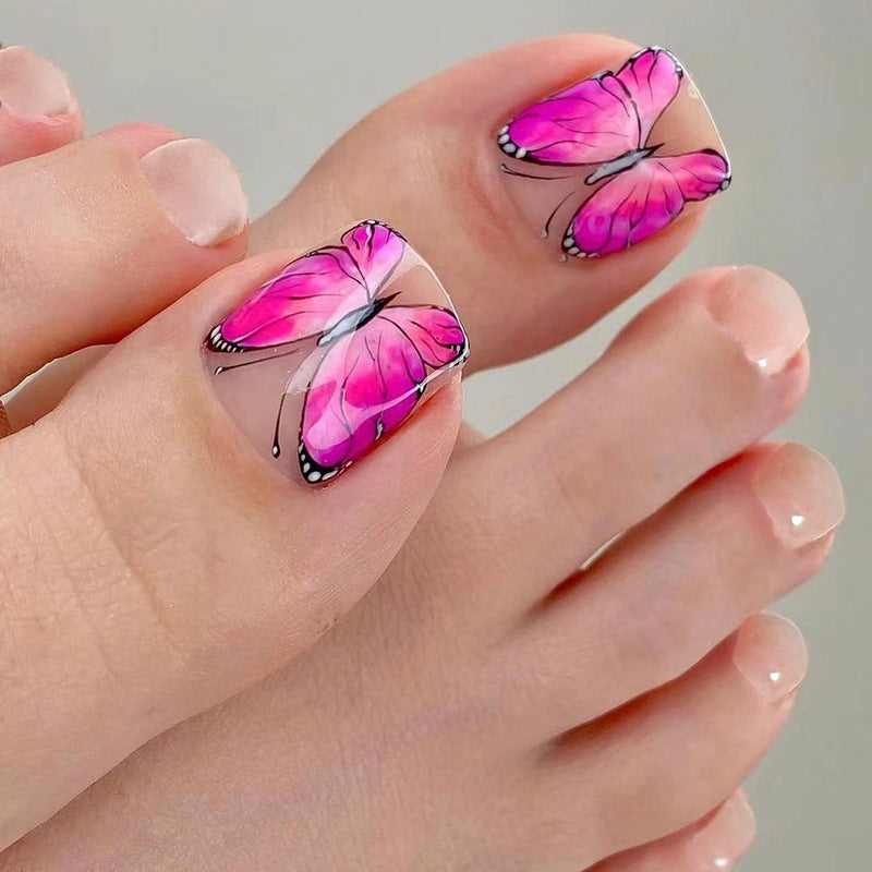 Artful toenail design with butterfly design Kalsten
