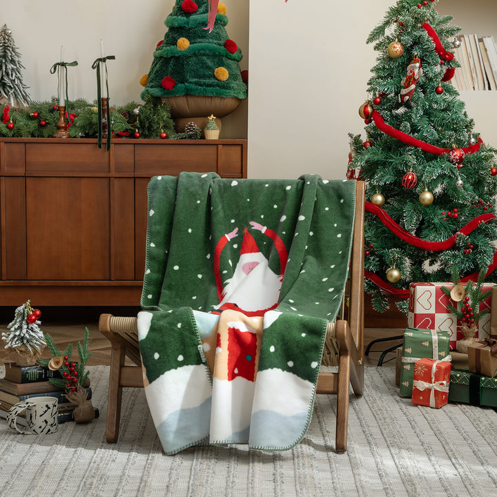 Soft Christmas fleece blanket with gift and gingerbread motif Kalsten