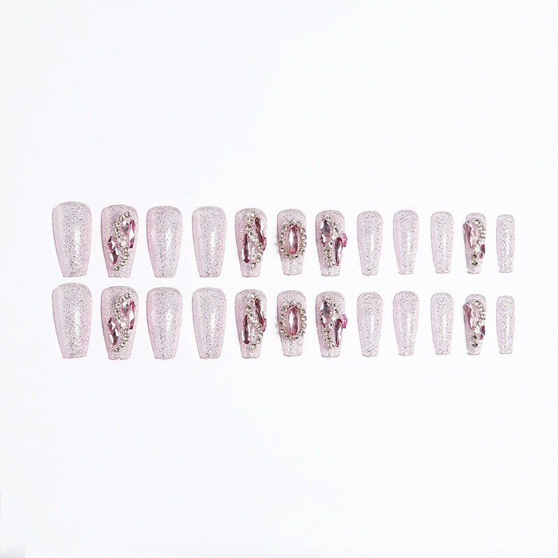 Glamorous artificial nails with sparkling rhinestone decorations Kalsten