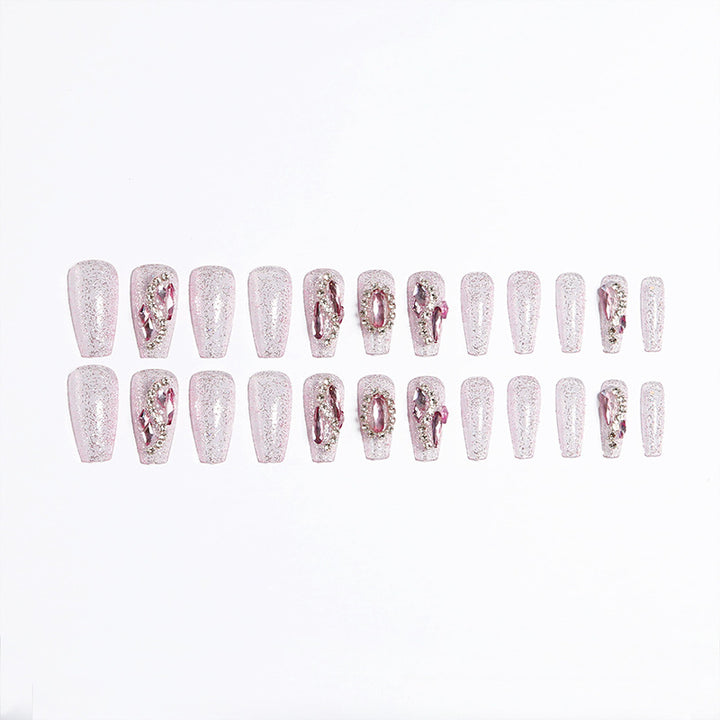 Glamorous artificial nails with sparkling rhinestone decorations Kalsten