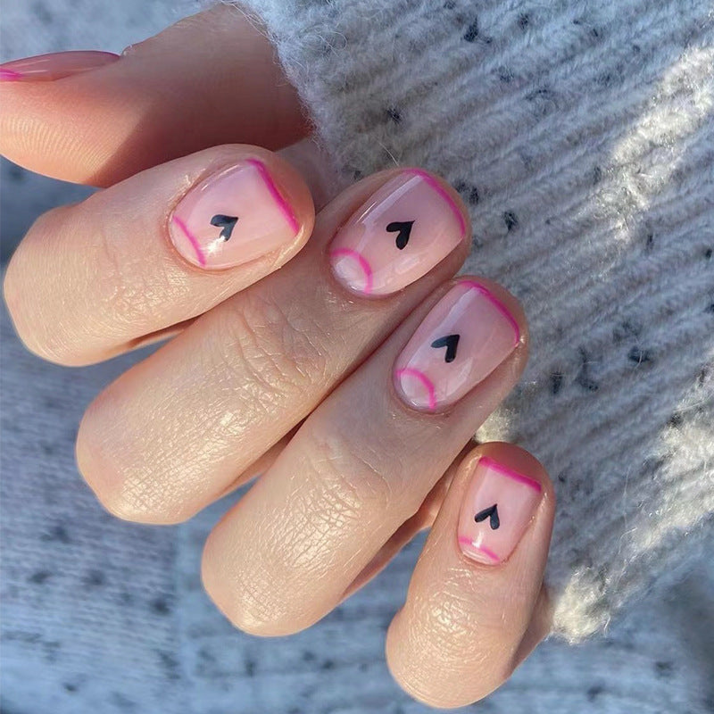 Creative Nail Art with Heart Design and Glitter Accents Kalsten