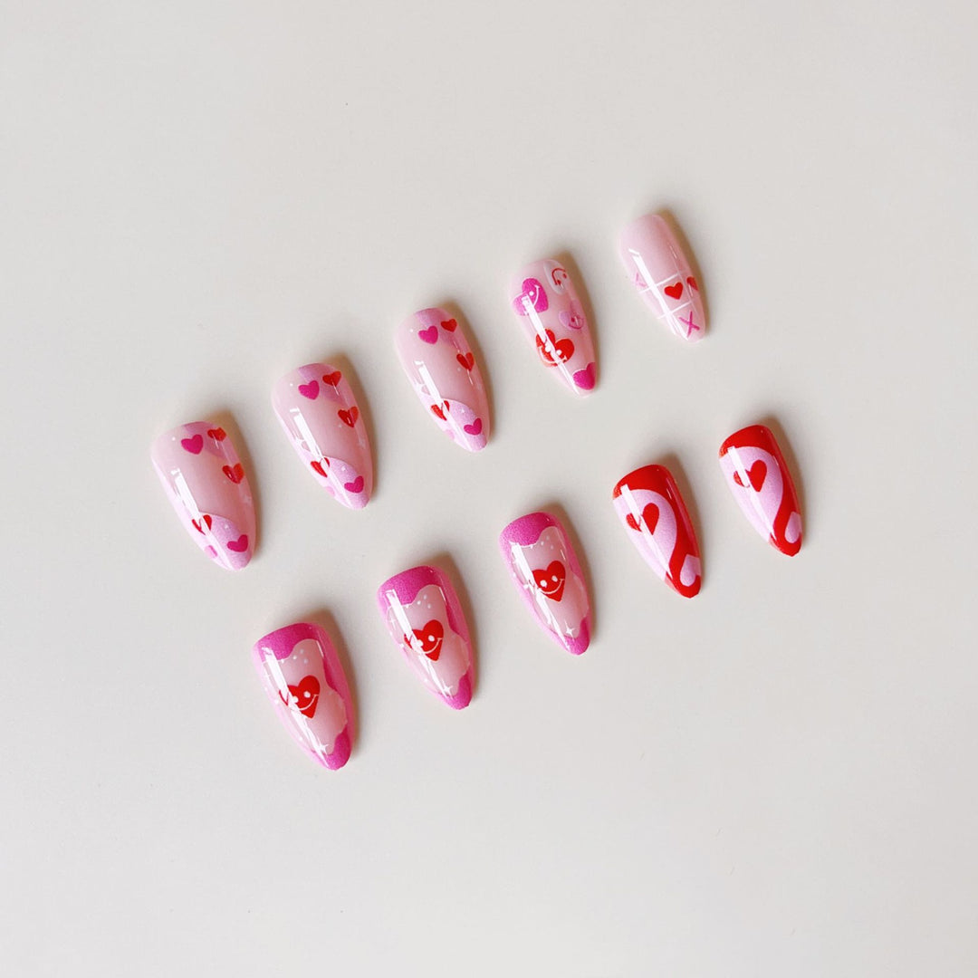 Acrylic nail set with romantic heart motifs and modern designs Kalsten