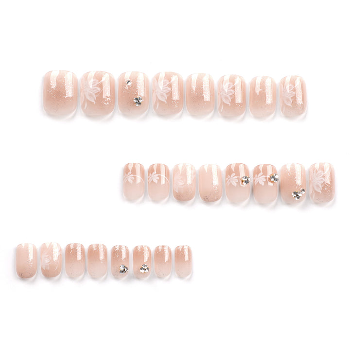 Elegant Nail Art with Holographic Accents and Floral Embellishments Kalsten