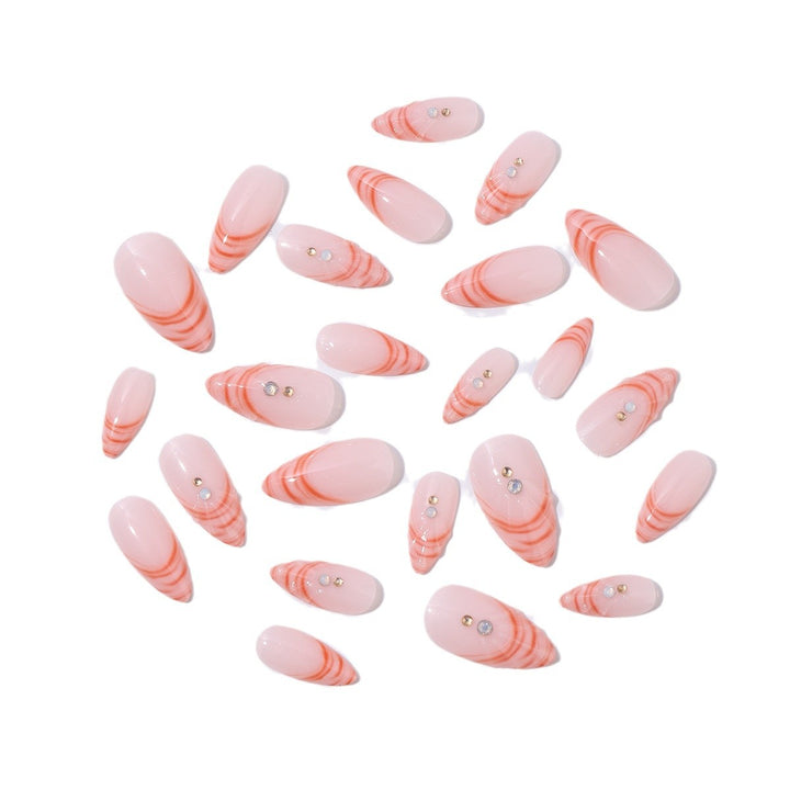 Acrylic nail set with curved tip style and glitter accents Kalsten