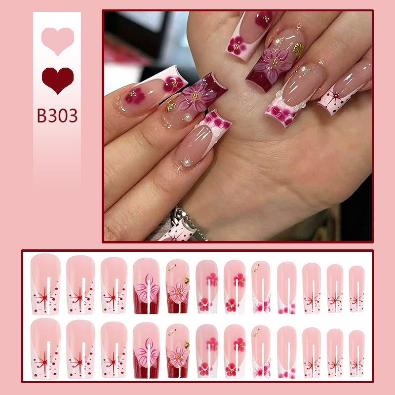 Artificial nail set with floral detail and glitter effects Kalsten