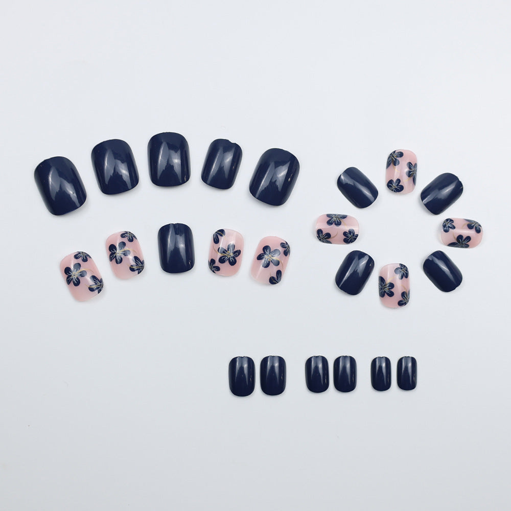 Artificial nails with floral designs and glossy accents Kalsten