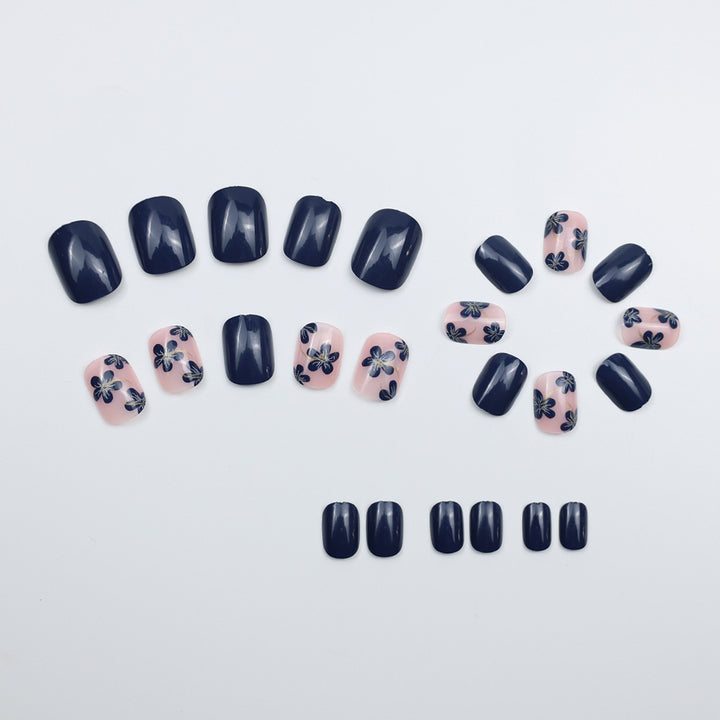 Artificial nails with floral designs and glossy accents Kalsten