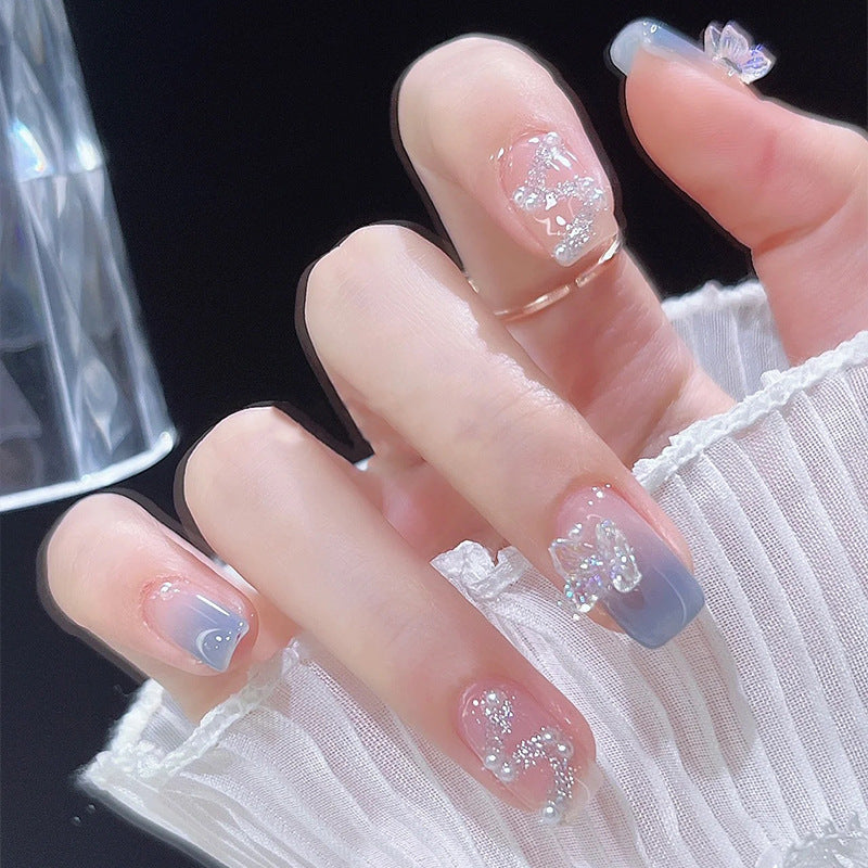 Acrylic nail set with sparkling glitter elements and appealing ombre design Kalsten