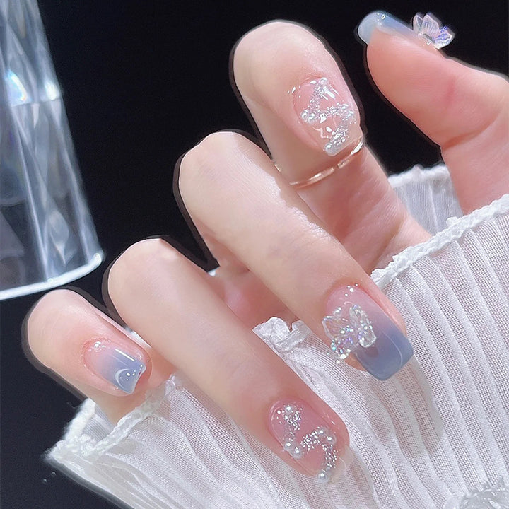 Acrylic nail set with sparkling glitter elements and appealing ombre design Kalsten