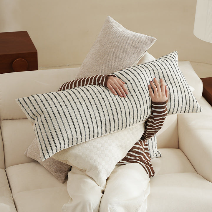 Long rectangular lumbar and neck pillow with textured woven look and concealed zipper Kalsten