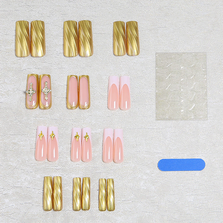 Acrylic nail set with elegant golden embellishments and glamorous accents Kalsten