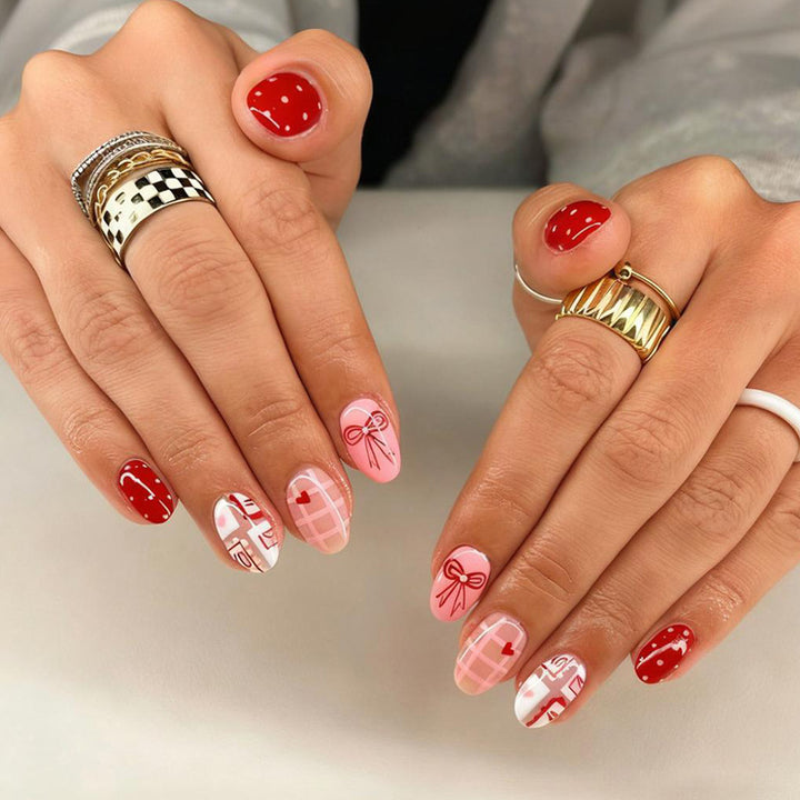 Artificial nail set with charming heart and bow patterns Kalsten