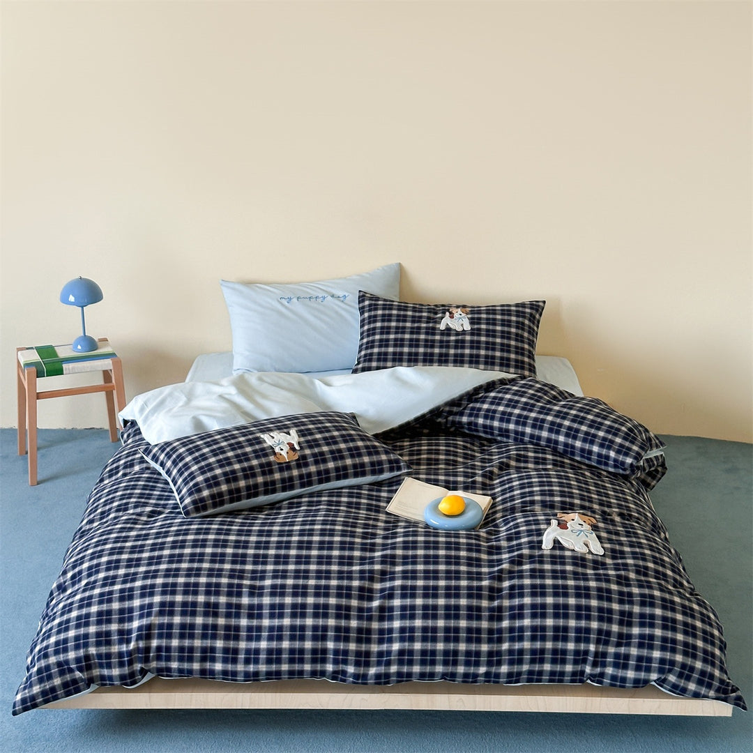 fine striped bed linen set with embroidered cat motif and soft cotton satin
