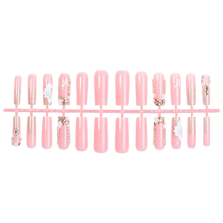 Creative acrylic nail set with delicate flower and gloss embellishments Kalsten