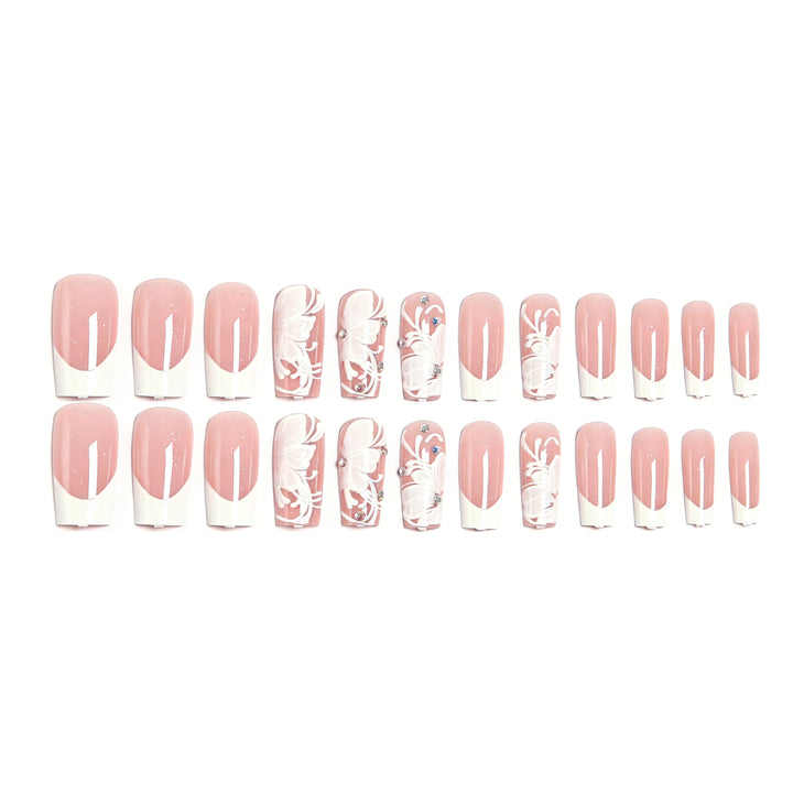 Artificial nails with floral embellishments and glitter details Kalsten