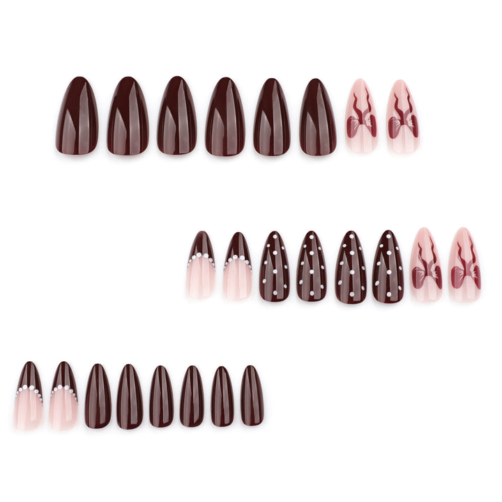 Elegantly designed stiletto nails with artistic accents Kalsten