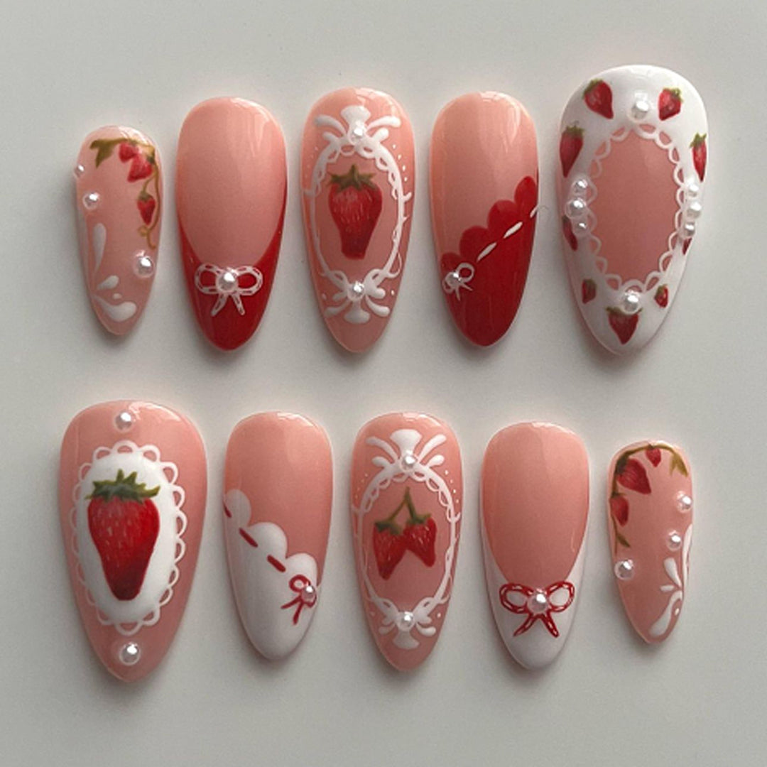 Artful nail extensions with strawberry motifs Kalsten