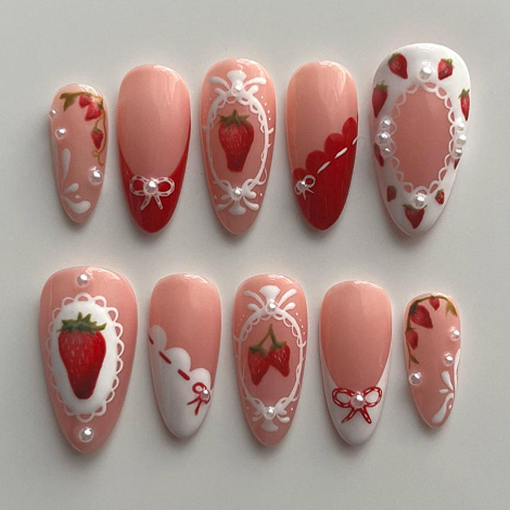Artful nail extensions with strawberry motifs Kalsten