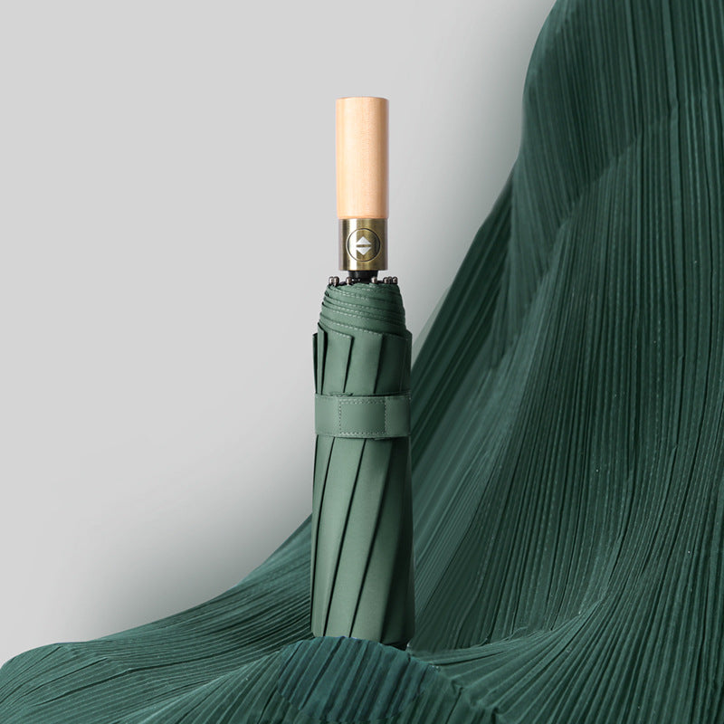 Ladies elegant foldable umbrella with ergonomic wooden handle and wind-resistant construction Kalsten