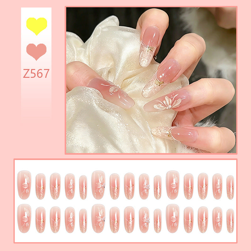 Acrylic nail set with filigree flower and glitter elements Kalsten