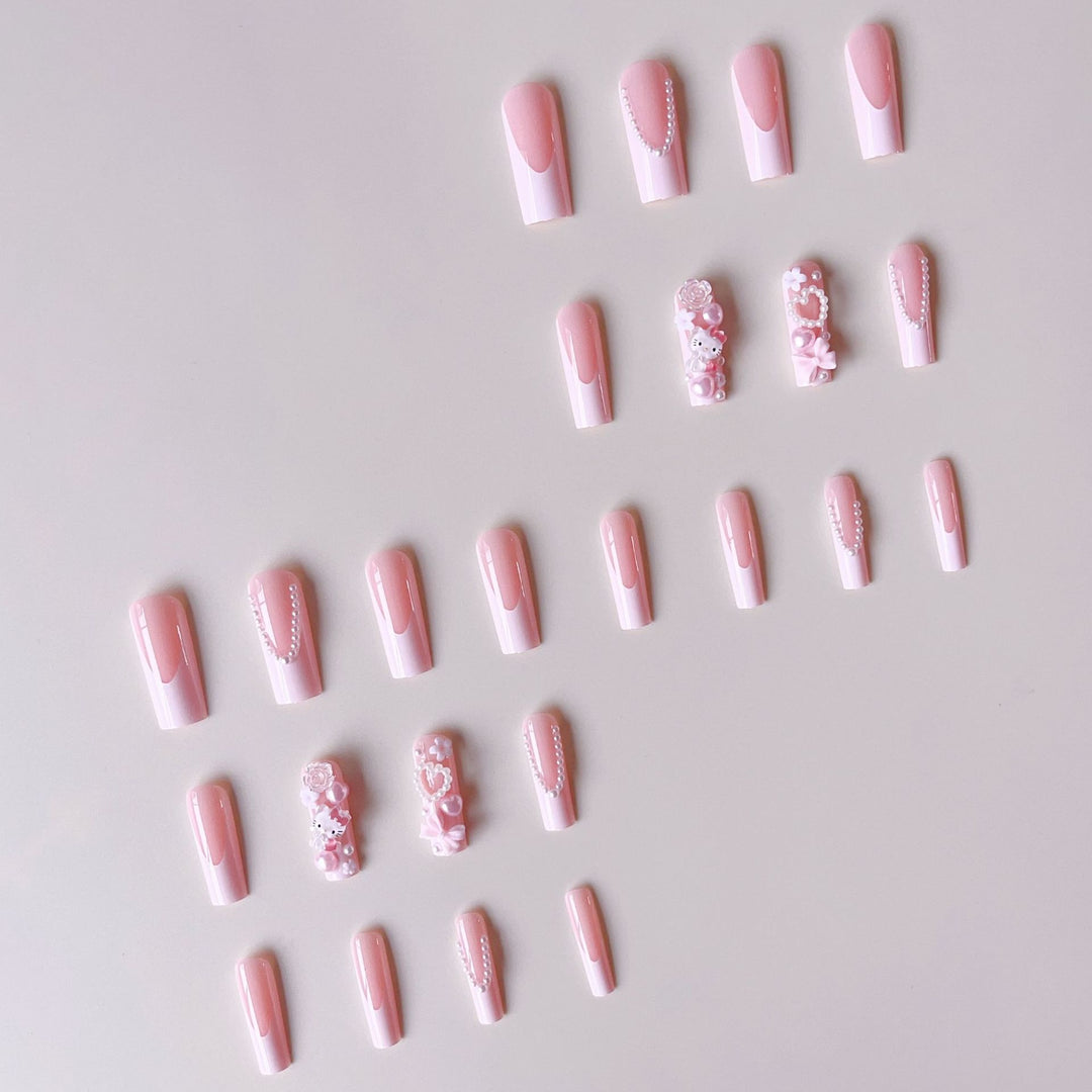Acrylic nail set with playful 3D accents and pearl details Kalsten