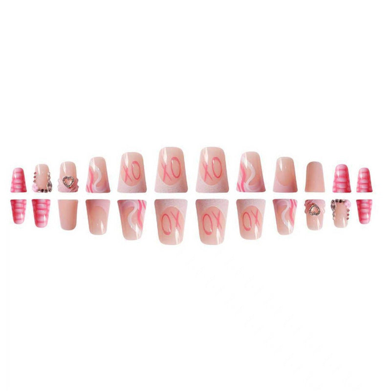 Decorative Press-On Nail Design with Heart and Gem Accents Kalsten