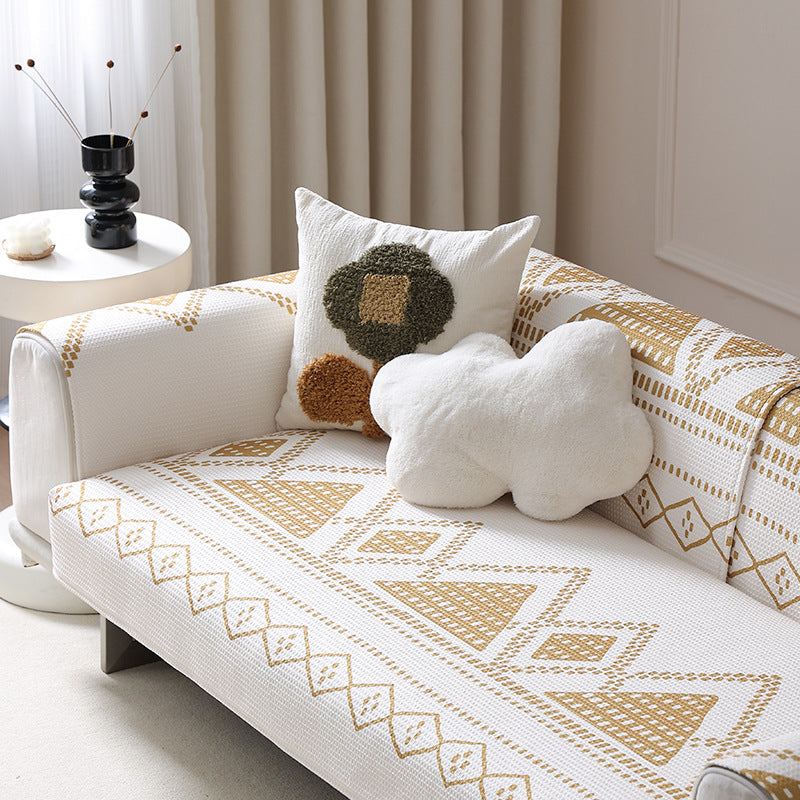 Stretch sofa cover with woven ethno jacquard and anti-slip
