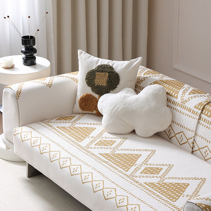 Stretch sofa cover with woven ethno jacquard and anti-slip