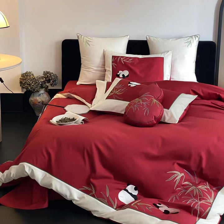 Duvet cover set made of cotton satin with applied animal embroidery and contrasting hem edge