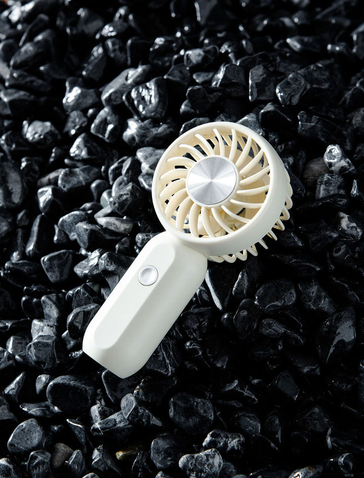 Women's portable mini fan with ergonomic grip technology Kalsten