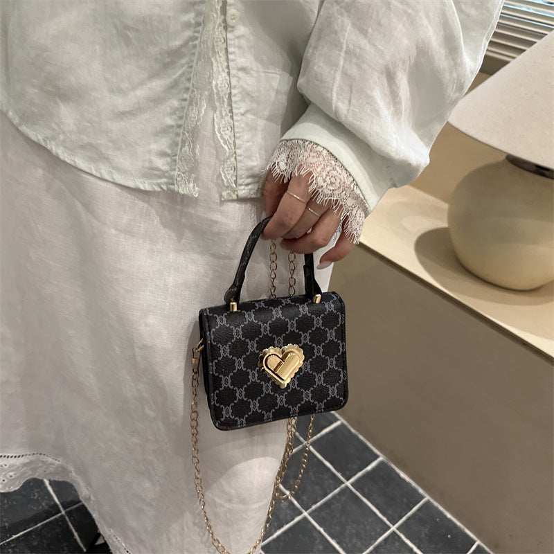 Elegant Heart-Embellished Handbag