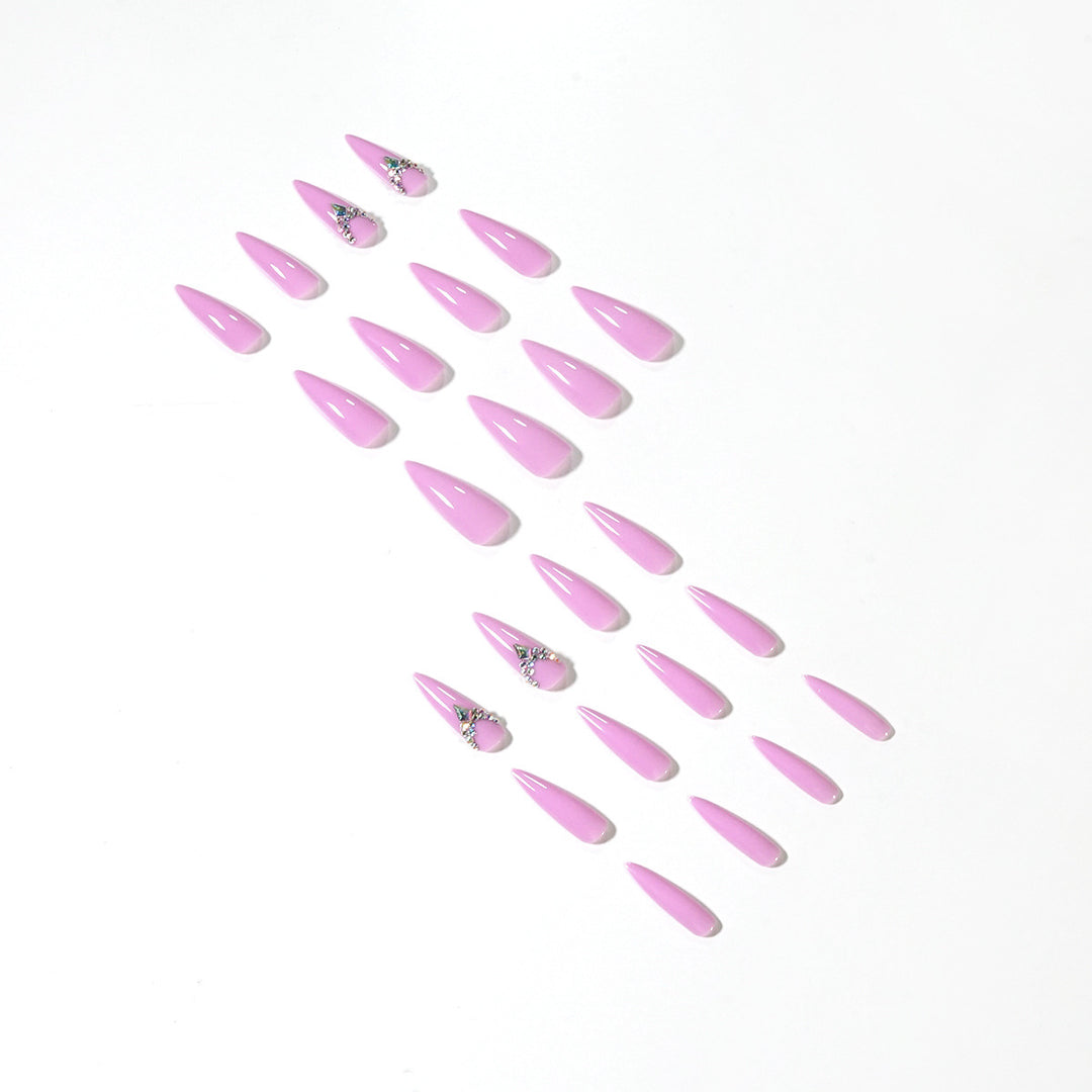 Glamorous stiletto nails with rhinestone decoration Kalsten