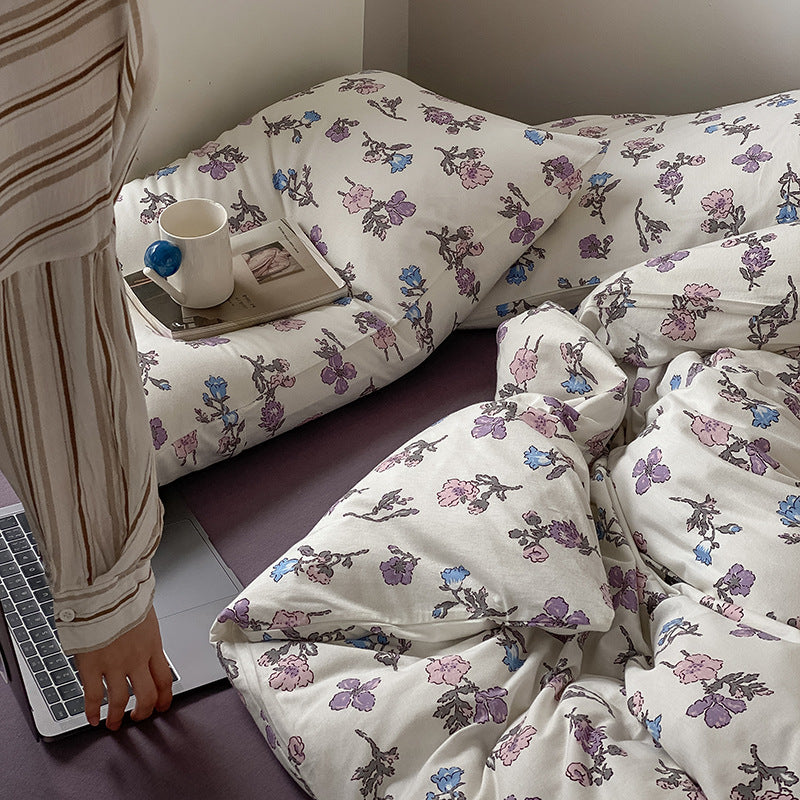 Cotton percale duvet cover and pillowcase set with fine watercolor flower print and hotel closure
