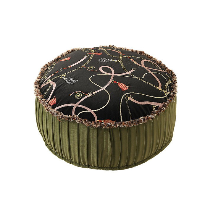 Round decorative floor cushion pouf with velvety printed top, pleated side wall, and fringe edge Kalsten