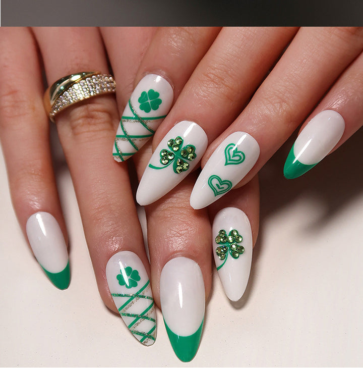 Artful nail extensions with an elegant leaf pattern Kalsten
