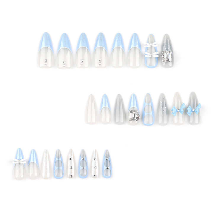 Artistic stiletto nails with elegant jewelry accents Kalsten