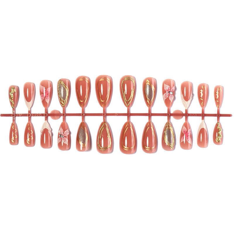 Artificial nail set with elegant blooming designs and golden accents Kalsten
